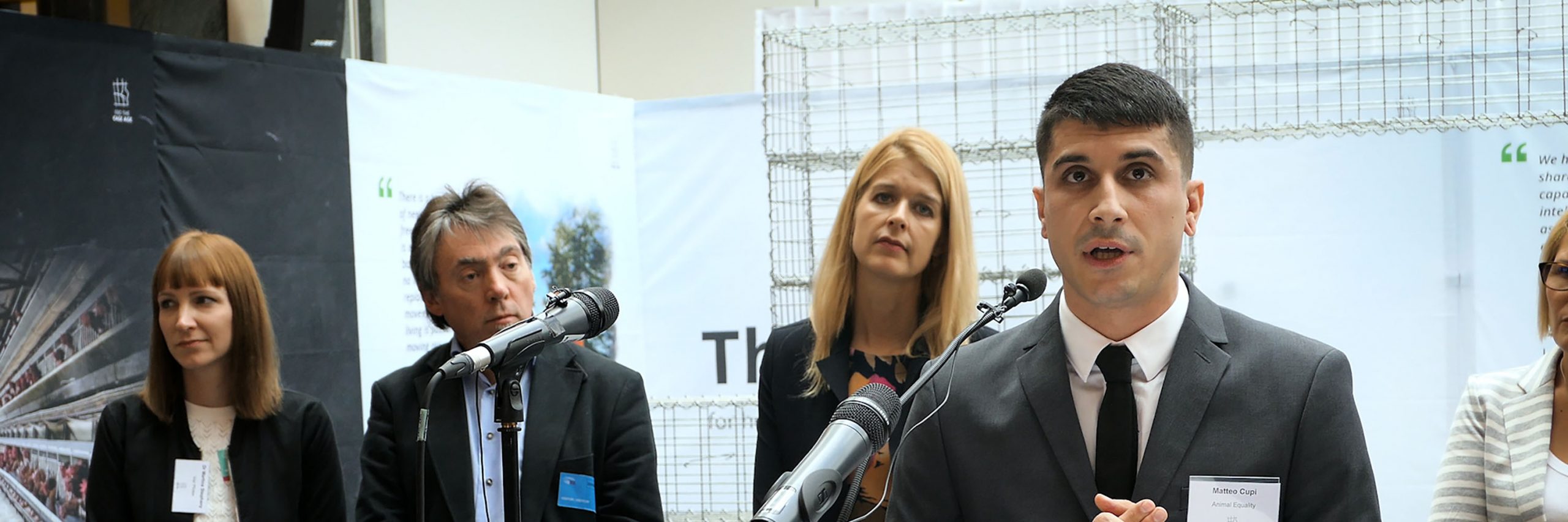 Face,Head,Public address system,Shirt,Coat,Tie,Suit